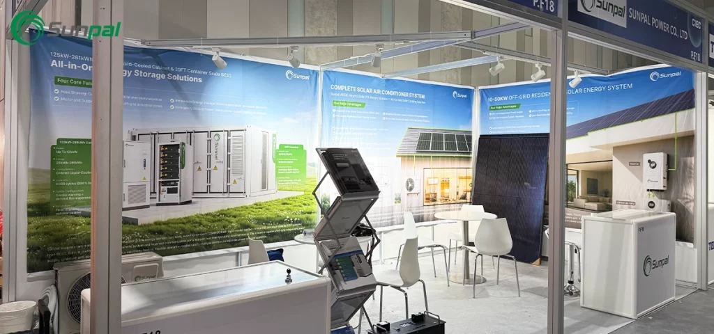 Sunpal exhibition booth featuring energy storage cabinets, solar panels, and a hybrid solar air conditioning system.